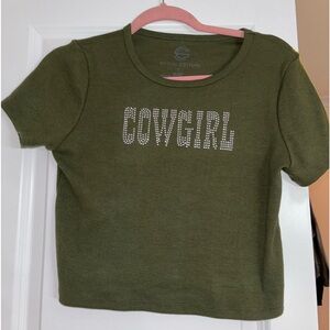 Green thick crop top with writing “Cowgirl”